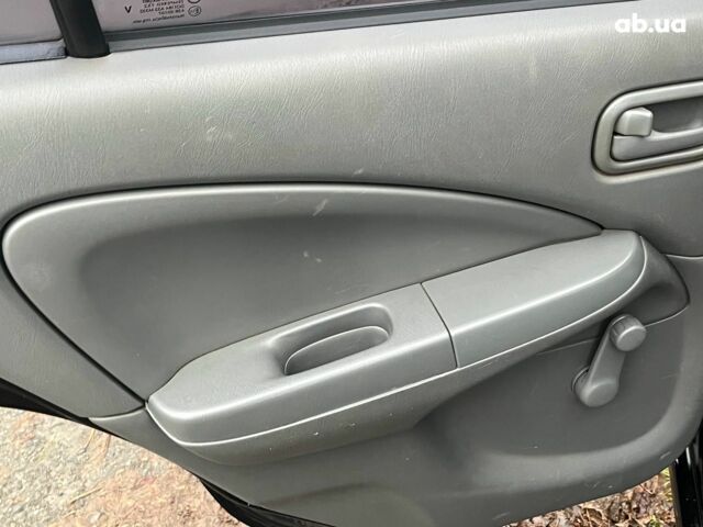 Черный Ниссан Альмера, объемом двигателя 1.6 л и пробегом 203 тыс. км за 5990 $, фото 26 на Automoto.ua