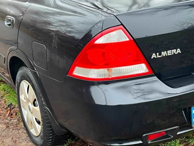 Черный Ниссан Альмера, объемом двигателя 1.6 л и пробегом 203 тыс. км за 5990 $, фото 8 на Automoto.ua