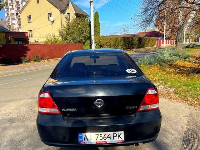Черный Ниссан Альмера, объемом двигателя 1.6 л и пробегом 300 тыс. км за 4250 $, фото 1 на Automoto.ua