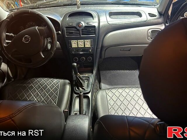 Чорний Ніссан Альмера, об'ємом двигуна 1.6 л та пробігом 197 тис. км за 3750 $, фото 3 на Automoto.ua