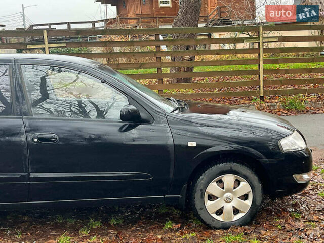 Чорний Ніссан Альмера, об'ємом двигуна 1.6 л та пробігом 203 тис. км за 5990 $, фото 14 на Automoto.ua