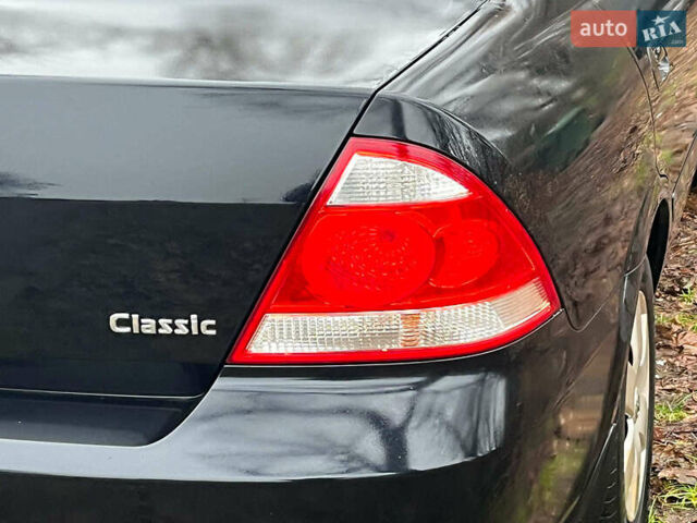 Чорний Ніссан Альмера, об'ємом двигуна 1.6 л та пробігом 203 тис. км за 5990 $, фото 10 на Automoto.ua