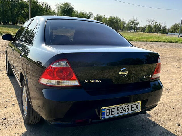 Черный Ниссан Альмера, объемом двигателя 1.6 л и пробегом 150 тыс. км за 5100 $, фото 6 на Automoto.ua