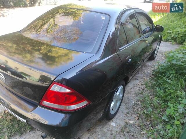 Черный Ниссан Альмера, объемом двигателя 1.6 л и пробегом 225 тыс. км за 5200 $, фото 5 на Automoto.ua