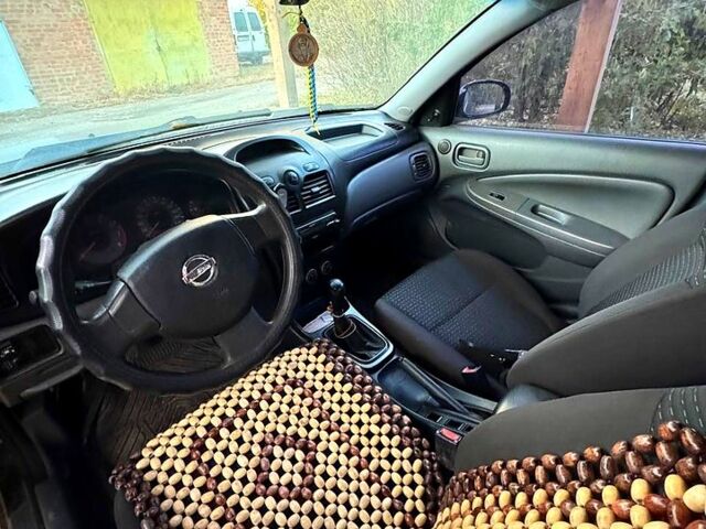 Черный Ниссан Альмера, объемом двигателя 1.6 л и пробегом 212 тыс. км за 5300 $, фото 3 на Automoto.ua