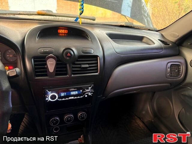 Черный Ниссан Альмера, объемом двигателя 1.6 л и пробегом 212 тыс. км за 5300 $, фото 6 на Automoto.ua