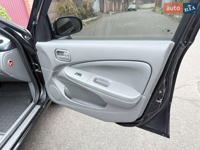 Черный Ниссан Альмера, объемом двигателя 1.6 л и пробегом 123 тыс. км за 6499 $, фото 16 на Automoto.ua