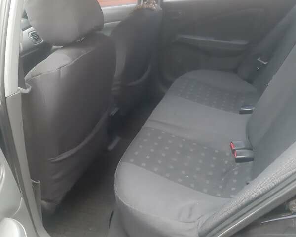 Чорний Ніссан Альмера, об'ємом двигуна 1.6 л та пробігом 63 тис. км за 6700 $, фото 13 на Automoto.ua