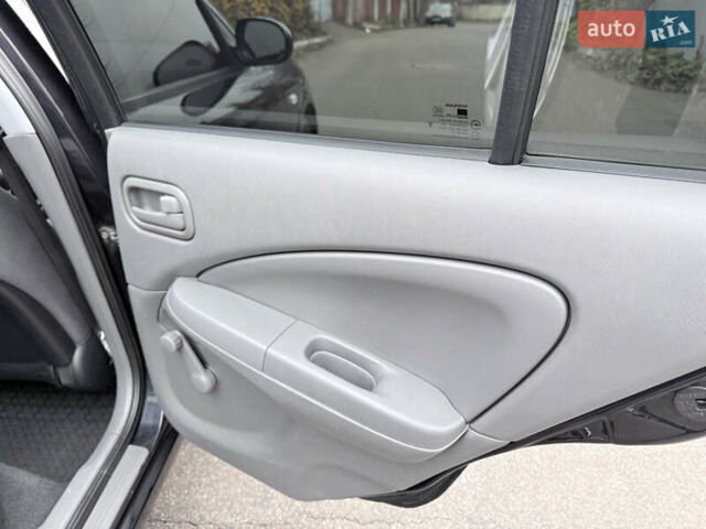 Черный Ниссан Альмера, объемом двигателя 1.6 л и пробегом 123 тыс. км за 6499 $, фото 17 на Automoto.ua