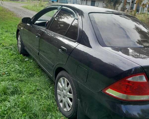 Чорний Ніссан Альмера, об'ємом двигуна 1.6 л та пробігом 241 тис. км за 4150 $, фото 6 на Automoto.ua