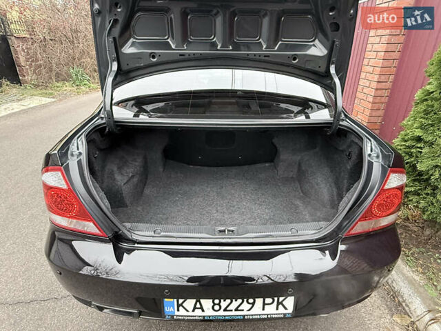 Черный Ниссан Альмера, объемом двигателя 1.6 л и пробегом 123 тыс. км за 6499 $, фото 9 на Automoto.ua