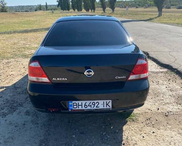 Черный Ниссан Альмера, объемом двигателя 1.6 л и пробегом 143 тыс. км за 6100 $, фото 3 на Automoto.ua