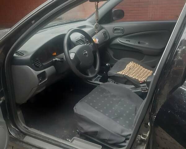 Чорний Ніссан Альмера, об'ємом двигуна 1.6 л та пробігом 63 тис. км за 6700 $, фото 5 на Automoto.ua