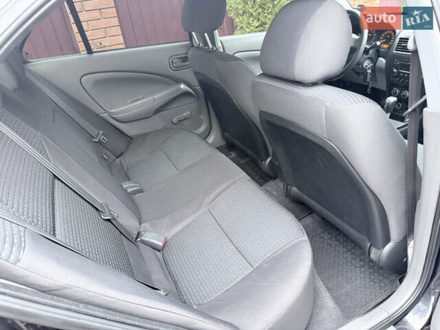 Черный Ниссан Альмера, объемом двигателя 1.6 л и пробегом 123 тыс. км за 6499 $, фото 18 на Automoto.ua