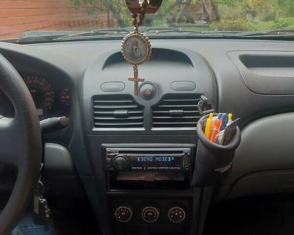 Чорний Ніссан Альмера, об'ємом двигуна 1.6 л та пробігом 63 тис. км за 6700 $, фото 14 на Automoto.ua