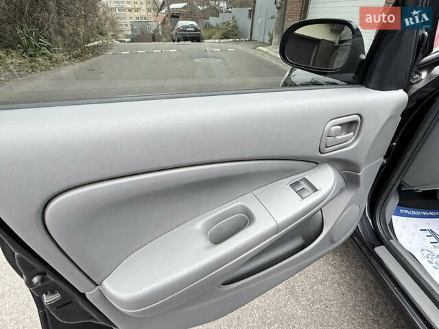 Черный Ниссан Альмера, объемом двигателя 1.6 л и пробегом 123 тыс. км за 6499 $, фото 12 на Automoto.ua