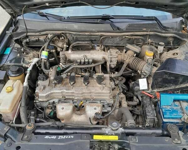 Чорний Ніссан Альмера, об'ємом двигуна 1.6 л та пробігом 241 тис. км за 4150 $, фото 7 на Automoto.ua