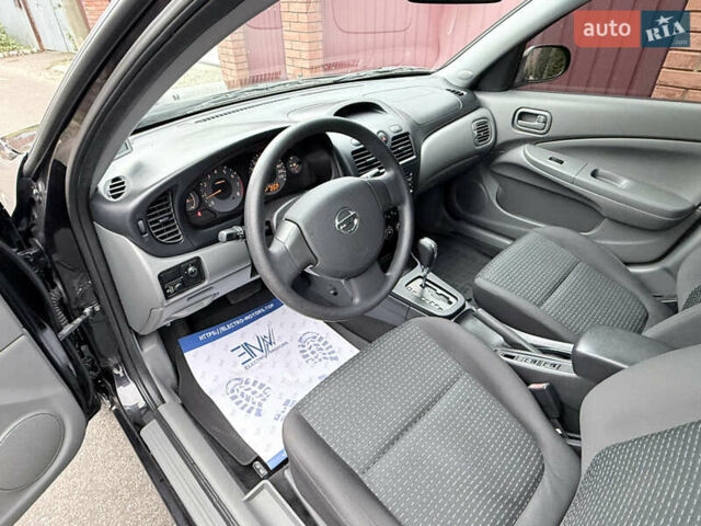Черный Ниссан Альмера, объемом двигателя 1.6 л и пробегом 123 тыс. км за 6499 $, фото 11 на Automoto.ua