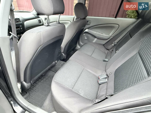 Черный Ниссан Альмера, объемом двигателя 1.6 л и пробегом 123 тыс. км за 6499 $, фото 14 на Automoto.ua