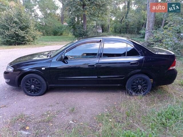 Черный Ниссан Альмера, объемом двигателя 1.6 л и пробегом 170 тыс. км за 6000 $, фото 6 на Automoto.ua