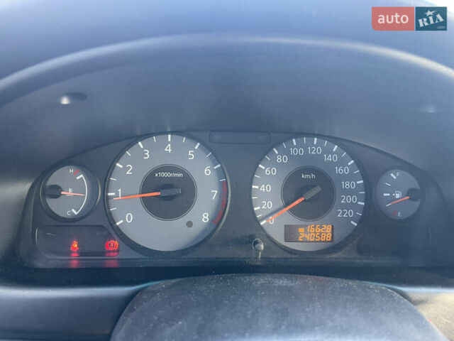 Черный Ниссан Альмера, объемом двигателя 1.6 л и пробегом 242 тыс. км за 5000 $, фото 13 на Automoto.ua