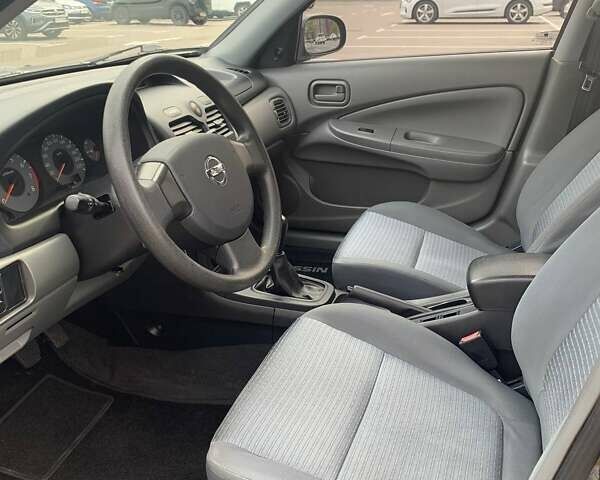 Черный Ниссан Альмера, объемом двигателя 1.6 л и пробегом 129 тыс. км за 6500 $, фото 12 на Automoto.ua