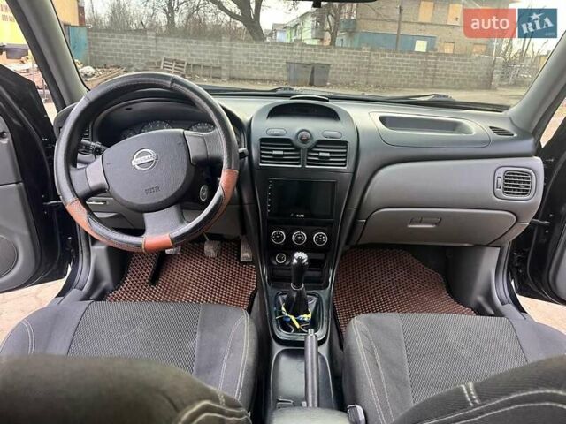 Чорний Ніссан Альмера, об'ємом двигуна 1.6 л та пробігом 140 тис. км за 5900 $, фото 1 на Automoto.ua