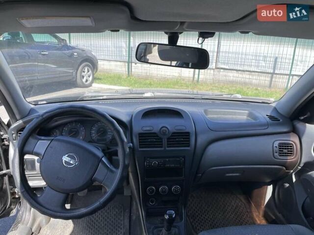 Черный Ниссан Альмера, объемом двигателя 1.6 л и пробегом 521 тыс. км за 3700 $, фото 6 на Automoto.ua