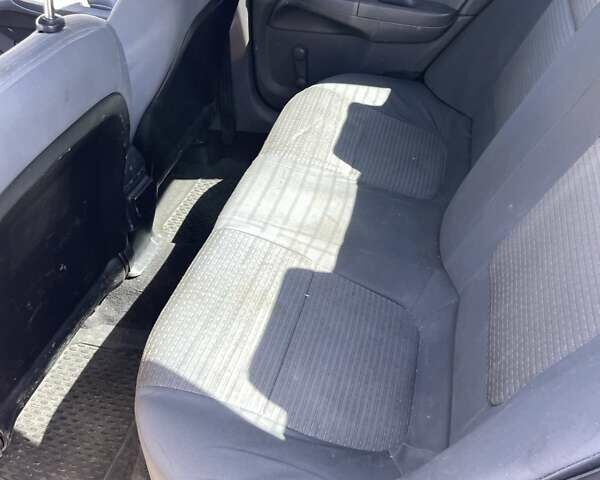 Черный Ниссан Альмера, объемом двигателя 1.6 л и пробегом 521 тыс. км за 3700 $, фото 3 на Automoto.ua