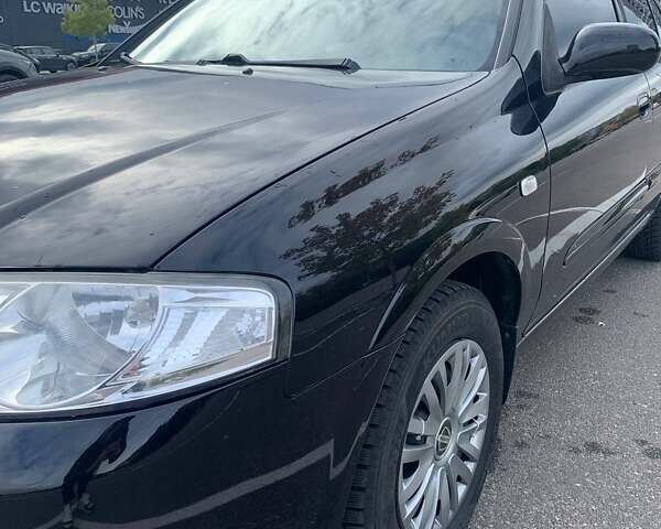 Черный Ниссан Альмера, объемом двигателя 1.6 л и пробегом 129 тыс. км за 6500 $, фото 8 на Automoto.ua