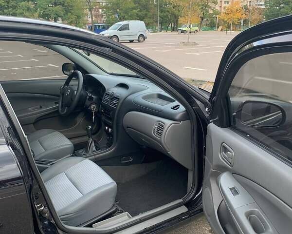 Черный Ниссан Альмера, объемом двигателя 1.6 л и пробегом 129 тыс. км за 6500 $, фото 11 на Automoto.ua