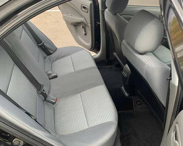 Черный Ниссан Альмера, объемом двигателя 1.6 л и пробегом 129 тыс. км за 6500 $, фото 17 на Automoto.ua