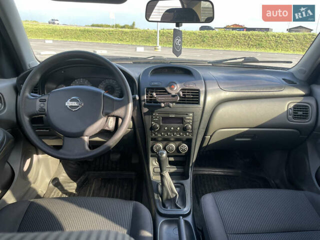 Черный Ниссан Альмера, объемом двигателя 1.6 л и пробегом 242 тыс. км за 5000 $, фото 8 на Automoto.ua