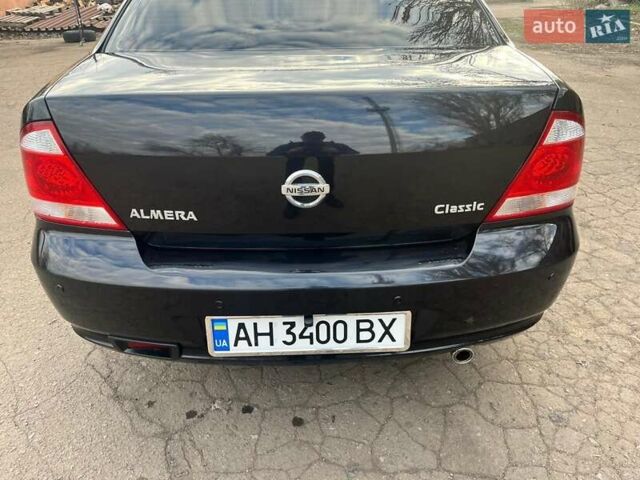 Чорний Ніссан Альмера, об'ємом двигуна 1.6 л та пробігом 140 тис. км за 5900 $, фото 12 на Automoto.ua