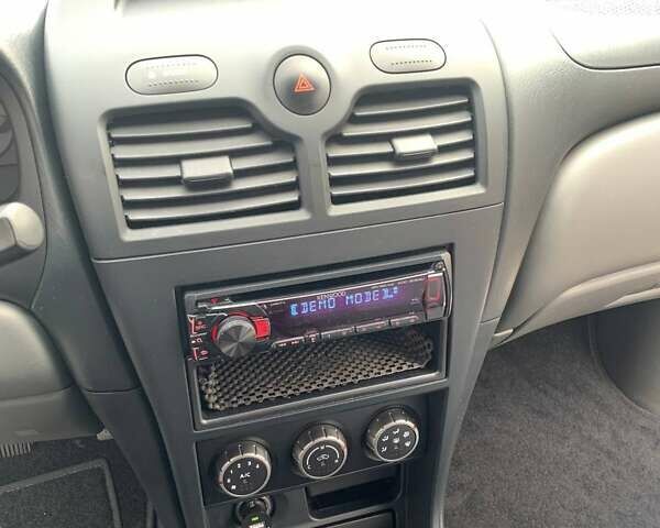 Черный Ниссан Альмера, объемом двигателя 1.6 л и пробегом 129 тыс. км за 6500 $, фото 14 на Automoto.ua