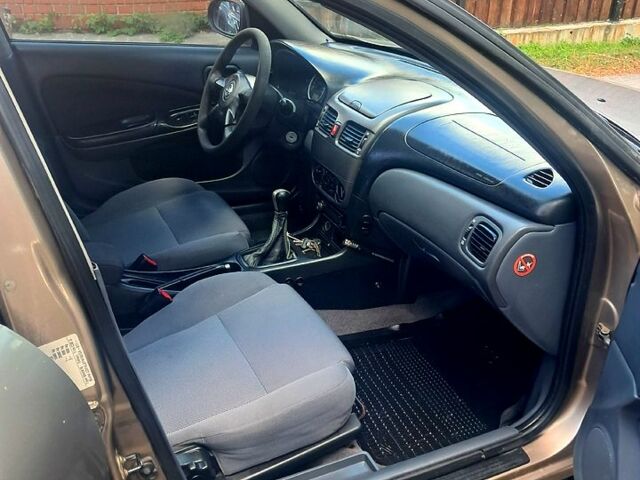 Коричневый Ниссан Альмера, объемом двигателя 1.5 л и пробегом 315 тыс. км за 3000 $, фото 9 на Automoto.ua