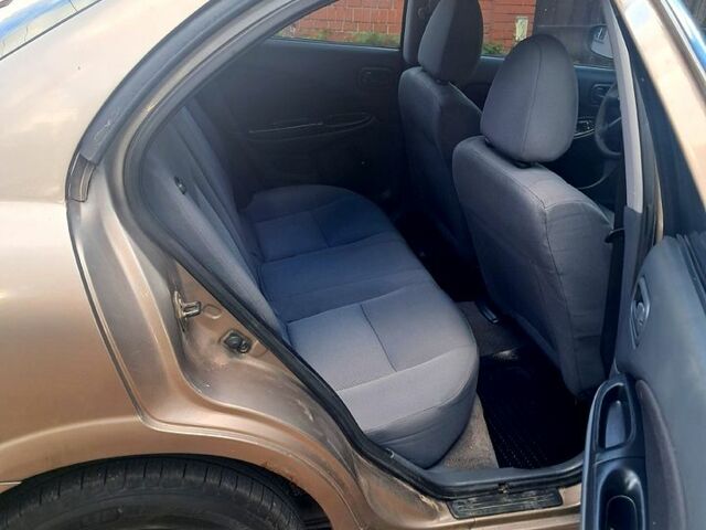 Коричневый Ниссан Альмера, объемом двигателя 1.5 л и пробегом 315 тыс. км за 3000 $, фото 10 на Automoto.ua