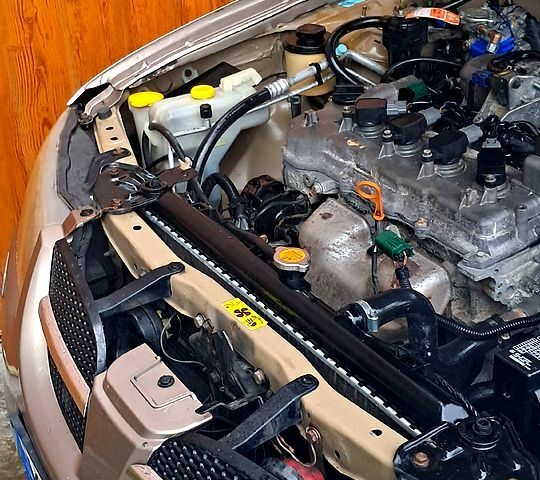 Коричневый Ниссан Альмера, объемом двигателя 1.5 л и пробегом 315 тыс. км за 3000 $, фото 12 на Automoto.ua