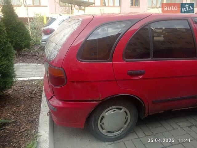 Красный Ниссан Альмера, объемом двигателя 1.39 л и пробегом 332 тыс. км за 1300 $, фото 10 на Automoto.ua