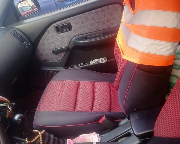 Красный Ниссан Альмера, объемом двигателя 1.39 л и пробегом 332 тыс. км за 1300 $, фото 15 на Automoto.ua