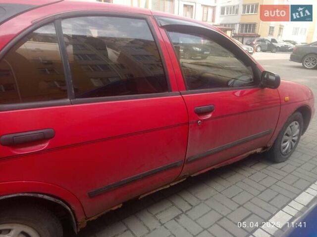 Красный Ниссан Альмера, объемом двигателя 1.39 л и пробегом 332 тыс. км за 1300 $, фото 7 на Automoto.ua