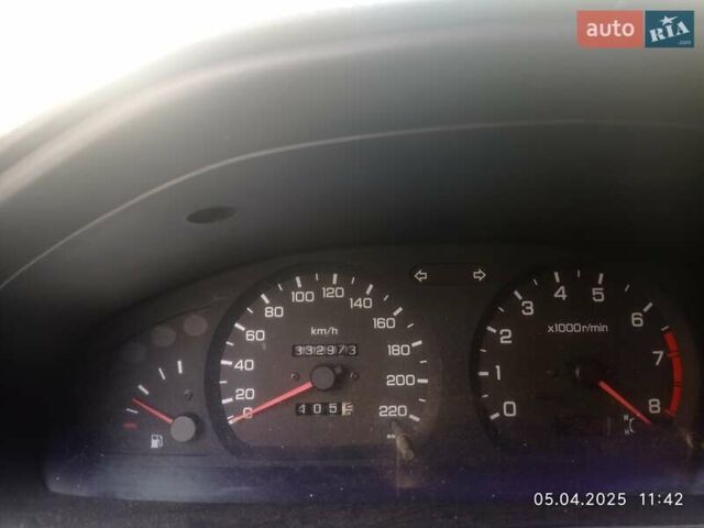 Красный Ниссан Альмера, объемом двигателя 1.39 л и пробегом 332 тыс. км за 1300 $, фото 4 на Automoto.ua