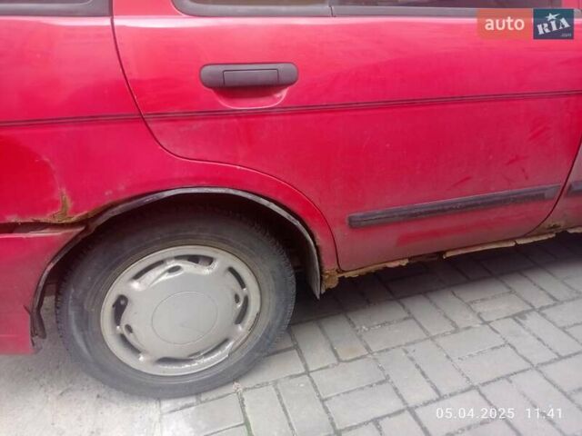 Красный Ниссан Альмера, объемом двигателя 1.39 л и пробегом 332 тыс. км за 1300 $, фото 8 на Automoto.ua