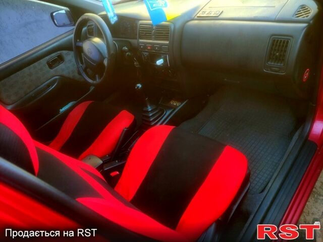 Червоний Ніссан Альмера, об'ємом двигуна 1.4 л та пробігом 0 тис. км за 1500 $, фото 10 на Automoto.ua