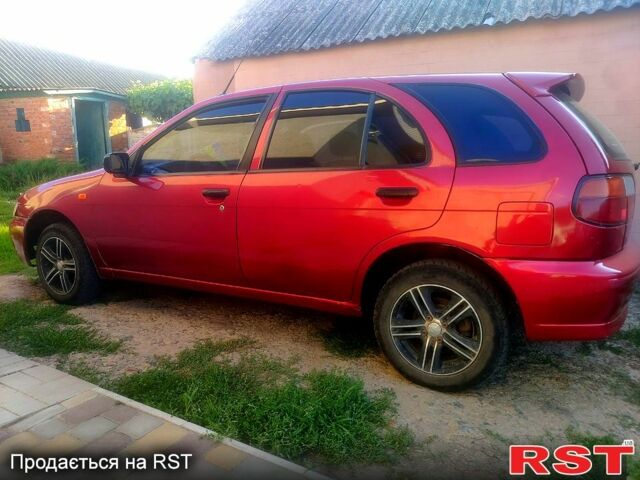 Червоний Ніссан Альмера, об'ємом двигуна 1.4 л та пробігом 0 тис. км за 1500 $, фото 7 на Automoto.ua