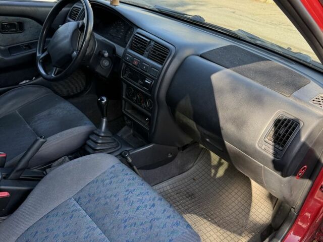 Червоний Ніссан Альмера, об'ємом двигуна 1.4 л та пробігом 293 тис. км за 1200 $, фото 6 на Automoto.ua