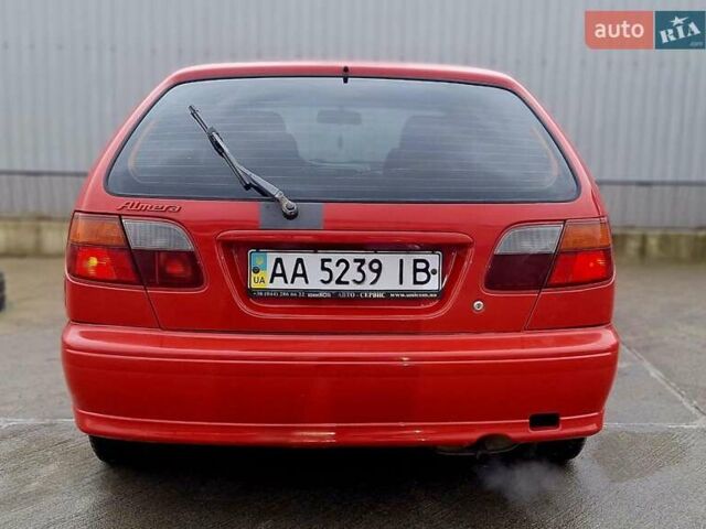 Красный Ниссан Альмера, объемом двигателя 1.39 л и пробегом 29 тыс. км за 2250 $, фото 5 на Automoto.ua