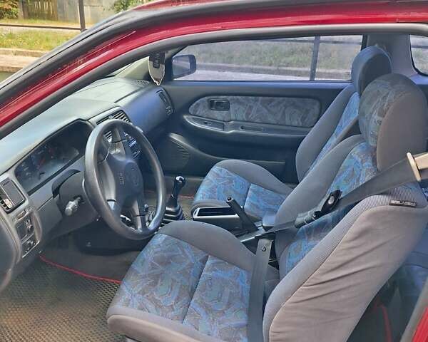 Красный Ниссан Альмера, объемом двигателя 1.39 л и пробегом 225 тыс. км за 2250 $, фото 1 на Automoto.ua