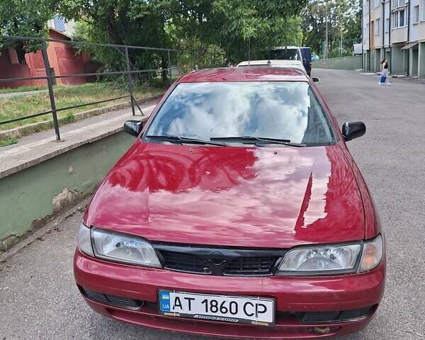 Красный Ниссан Альмера, объемом двигателя 1.39 л и пробегом 225 тыс. км за 2250 $, фото 3 на Automoto.ua