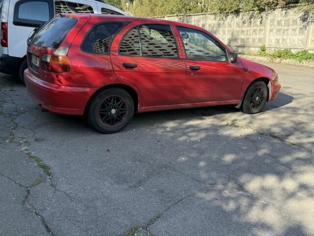 Червоний Ніссан Альмера, об'ємом двигуна 1.4 л та пробігом 293 тис. км за 1200 $, фото 1 на Automoto.ua